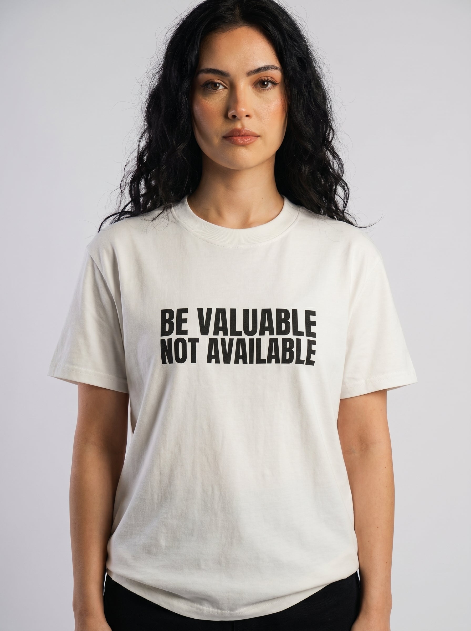 Be Valuable, Not Available – Statement Tee