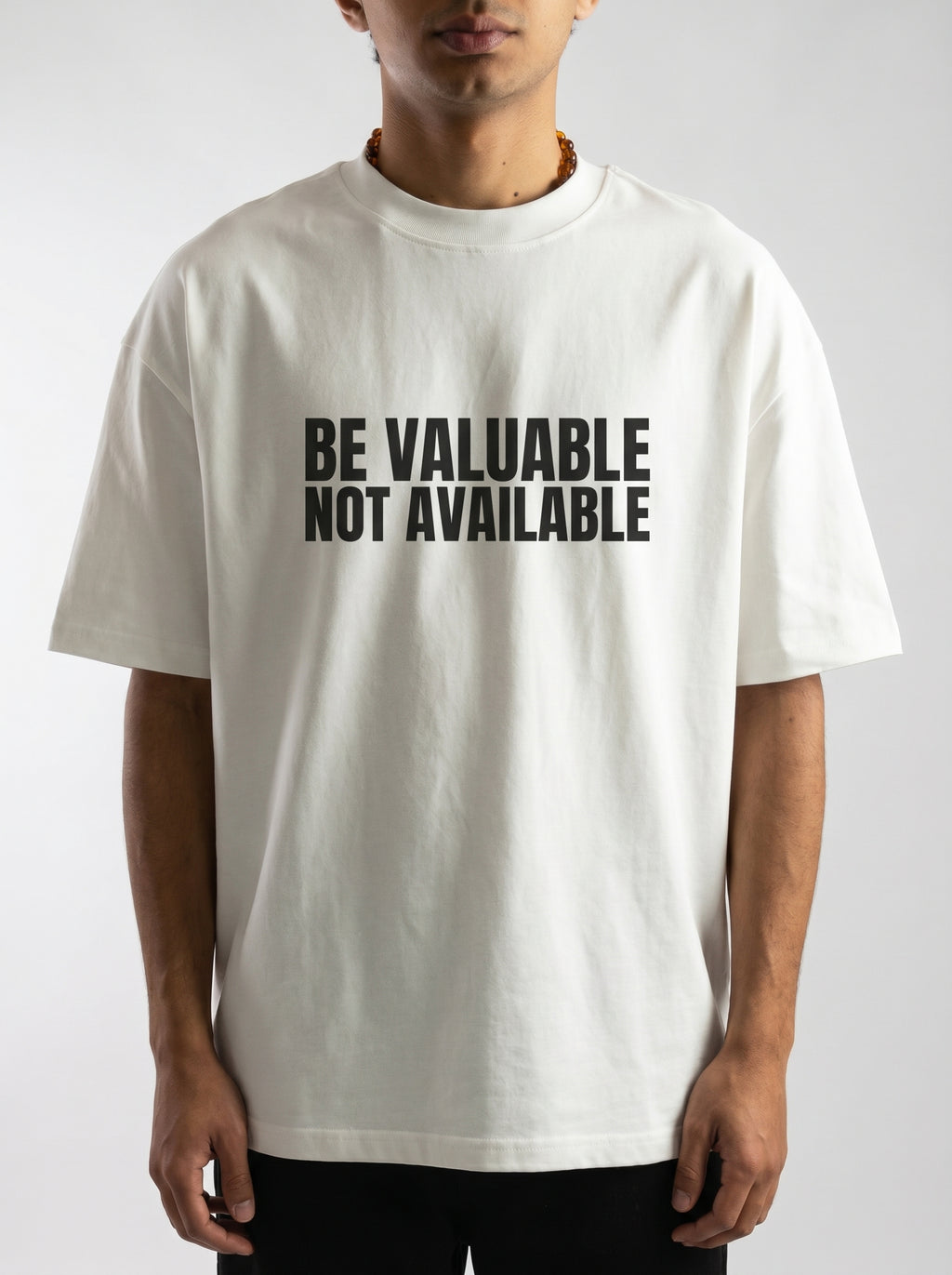 Be Valuable, Not Available – Statement Tee