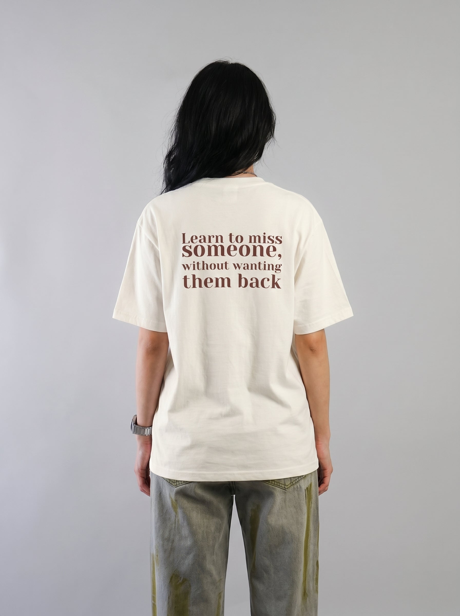 Learn To Miss Someone – Quote Tee
